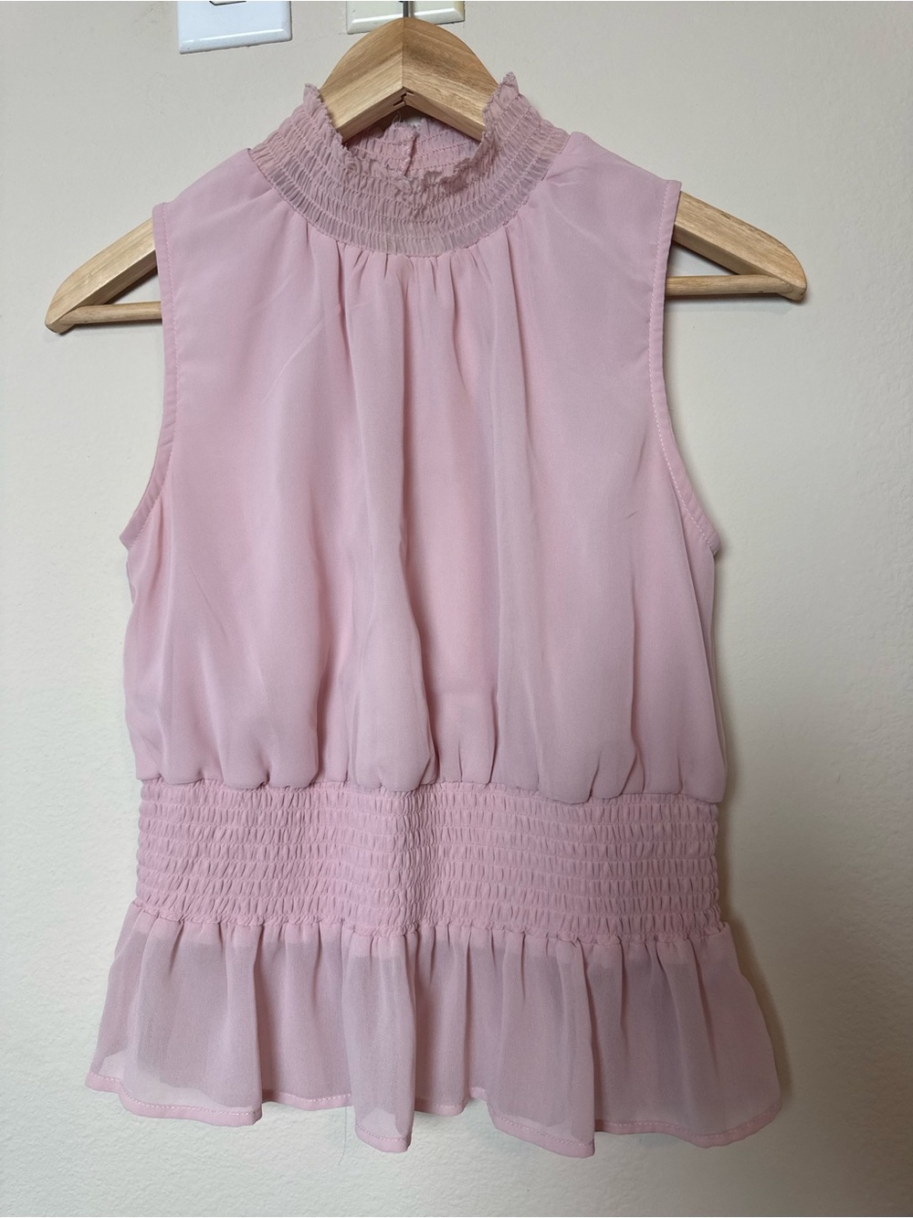 Japna Light Pink Sleeveless Smocked Peplum Blouse